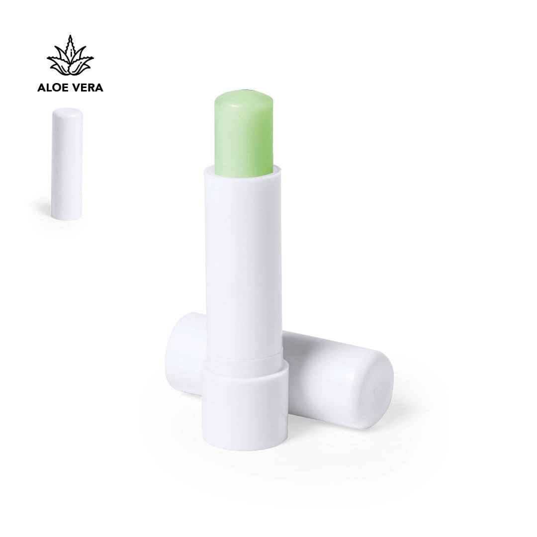 A green lip balm in a white twist-up tube, featuring a logo. The tube is positioned upright next to a cap. A green lip balm in a white twist-up tube, featuring a logo. The tube is positioned upright next to a cap.