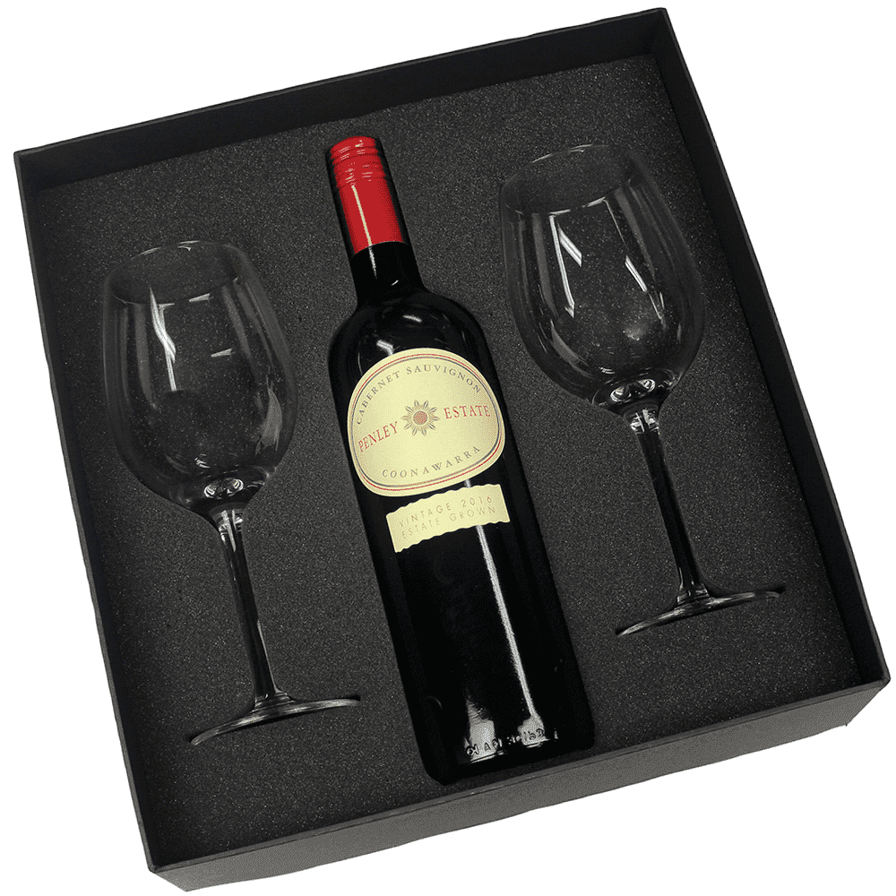 A wine box featuring a red wine bottle and two clear wine glasses, all in a black cushioned packaging. Wine Box - Image 1