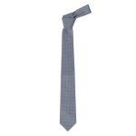 A cravat tie in a light blue colour with a polka dot pattern and a slender design. It features a branding logo.