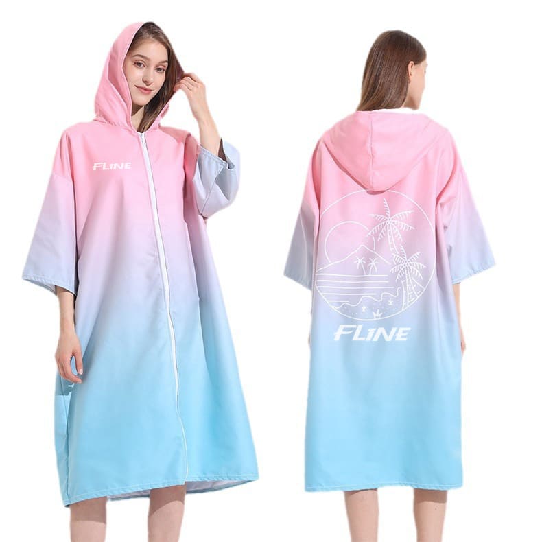 A hooded change towel in pink and light blue with a zip, featuring a logo and a tropical design on the back. Quick-Drying Sublimation Hooded Change Towel with Zip - Image 1