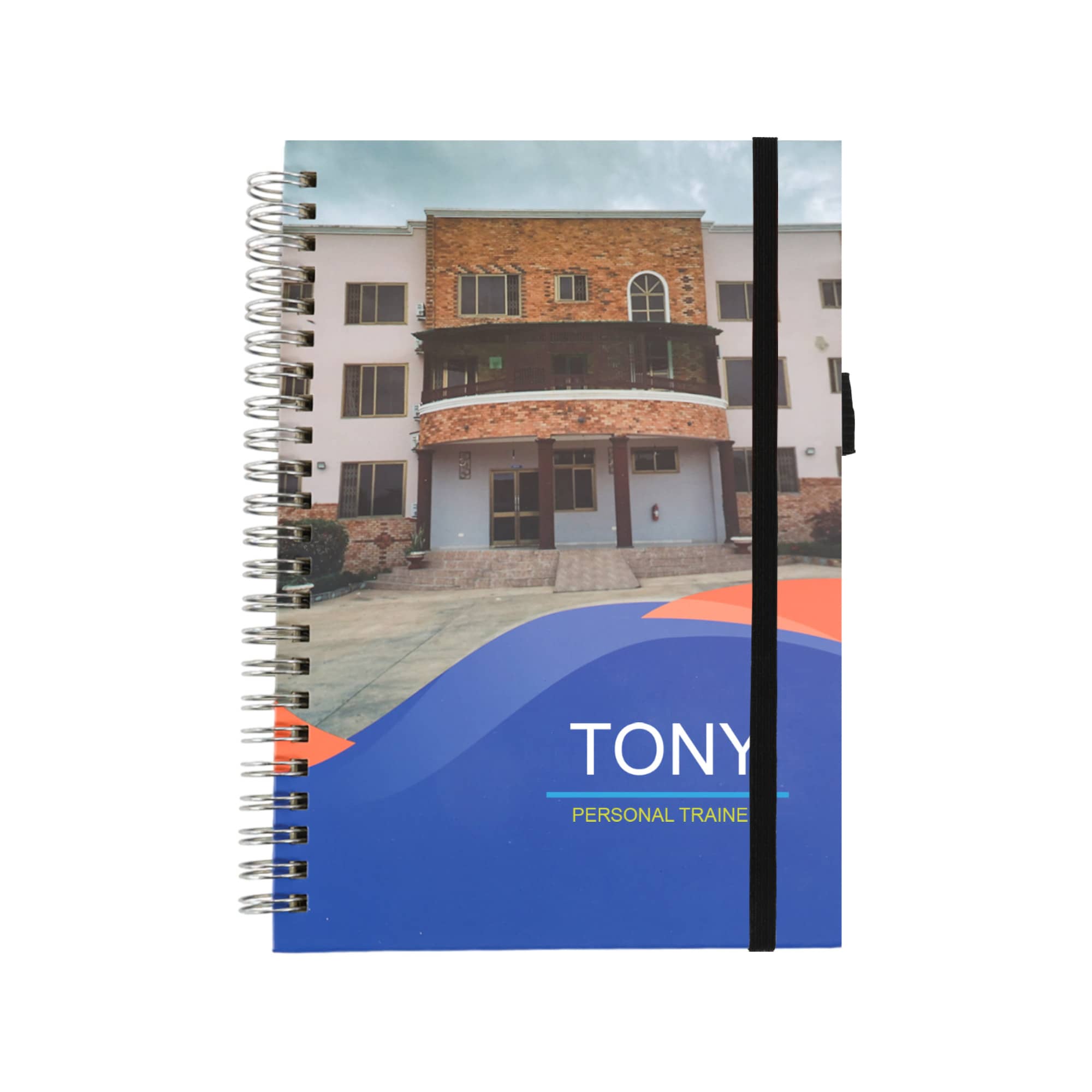 A5 wiro-bound notebook featuring a colourful design with a black elastic band closure. A5 Wiro Side Bound Notebook - Image 1