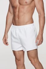 White men's rugby shorts with an elastic waistband, designed for sports activities. Features a logo on the waistband.