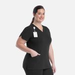 A black curved V-neck top designed for women, featuring a pocket and a logo on the upper side.