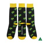 Three pairs of black socks featuring green and yellow floral patterns, with a logo on one side.