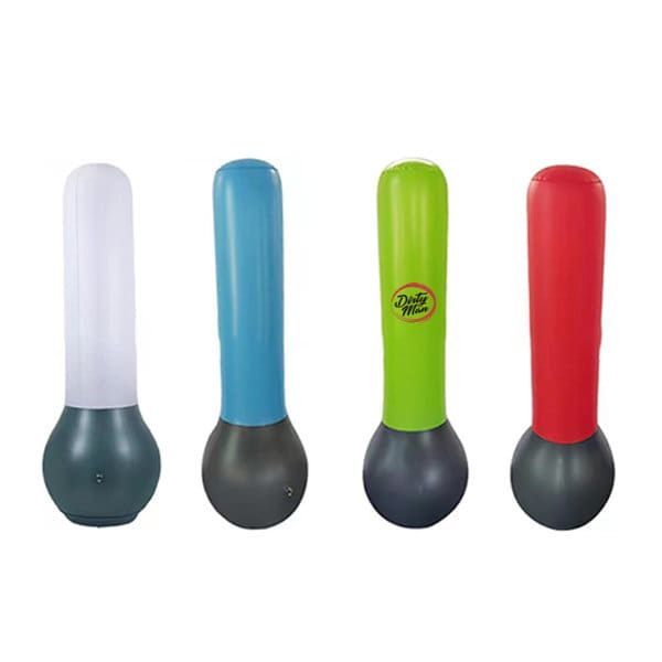 Four inflatable PVC punching bags in various bright colours: blue, green, red, and white, each with a round base. Four inflatable PVC punching bags in various bright colours: blue, green, red, and white, each with a round base.