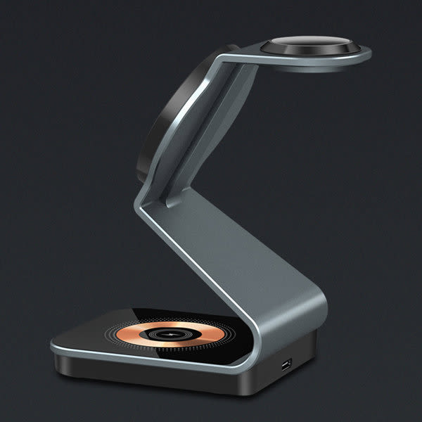 A sleek silver 3 in 1 magnetic wireless charging stand with a modern design and a black charging surface. A sleek silver 3 in 1 magnetic wireless charging stand with a modern design and a black charging surface.