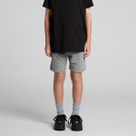 Youth stadium shorts in light grey, featuring a comfortable fit and a stylish design, paired with black shoes and grey socks.