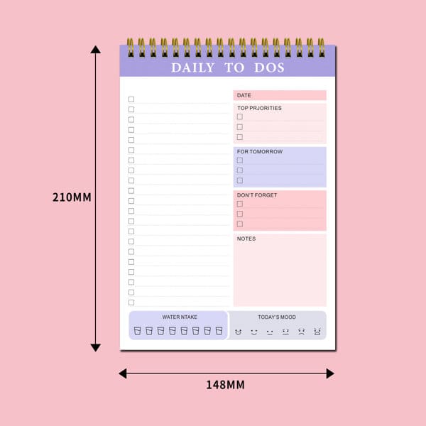 A purple and white coil notebook with sections for daily tasks, priorities, notes, and mood tracking. A purple and white coil notebook with sections for daily tasks, priorities, notes, and mood tracking.