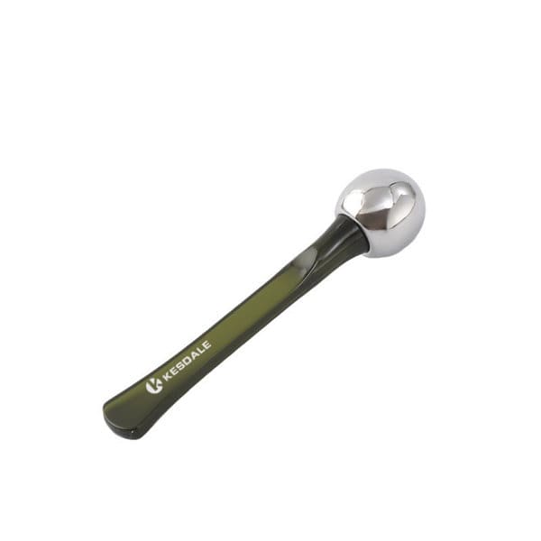 An eye roller massage stick featuring a silver roller and a black handle, with a logo on the side. An eye roller massage stick featuring a silver roller and a black handle, with a logo on the side.