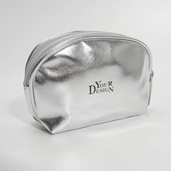 A silver shell-shaped zipper makeup bag with a branded logo on the front. A silver shell-shaped zipper makeup bag with a branded logo on the front.