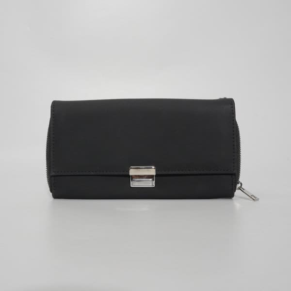 A black microfiber leather wallet with a zip closure and a silver clasp, featuring a chain attachment. A black microfiber leather wallet with a zip closure and a silver clasp, featuring a chain attachment.