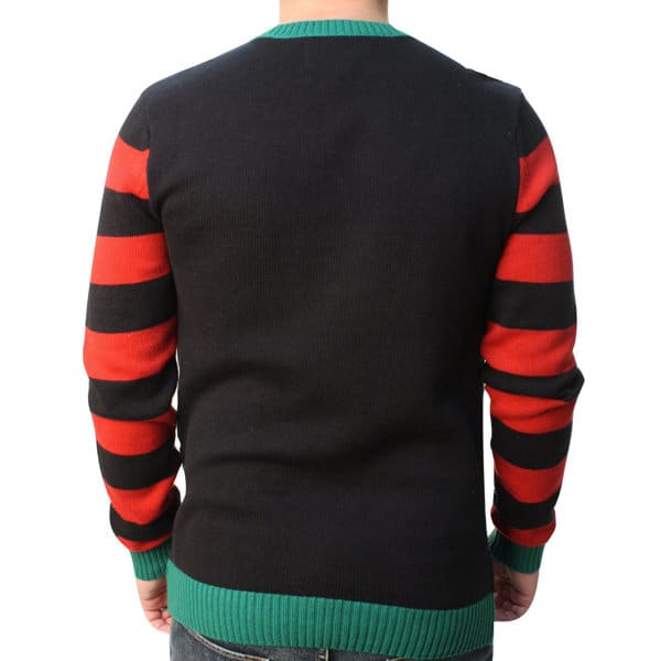 A black sweater with red and green stripes on the sleeves, featuring a ribbed green neckline and hem. A black sweater with red and green stripes on the sleeves, featuring a ribbed green neckline and hem.