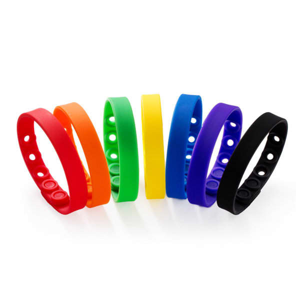 A collection of adjustable silicone wristbands in red, orange, yellow, green, blue, purple, and black, with buttons and branding. A collection of adjustable silicone wristbands in red, orange, yellow, green, blue, purple, and black, with buttons and branding.