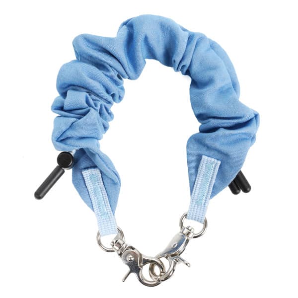 A light blue scrunchie-style phone wrist lanyard with clip attachments and a branding logo. A light blue scrunchie-style phone wrist lanyard with clip attachments and a branding logo.