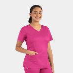 A pink women's double V-neck top featuring short sleeves and a side pocket, with a logo present.