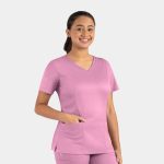 A pink women's double V-neck top with short sleeves and pockets, featuring a logo on the side.