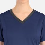 A navy blue women's top featuring a contrast double V-neck and grey trim. The design includes a logo.