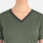 A green women's top featuring a contrast double V-neck design and shoulder buttons, with a logo.