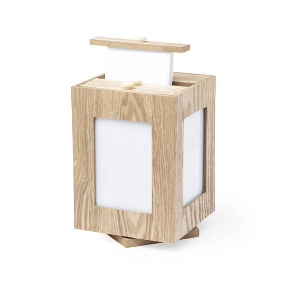 A rotating cube MDF wood photo frame in light wood finish, featuring four photo openings and a modern design. A rotating cube MDF wood photo frame in light wood finish, featuring four photo openings and a modern design.