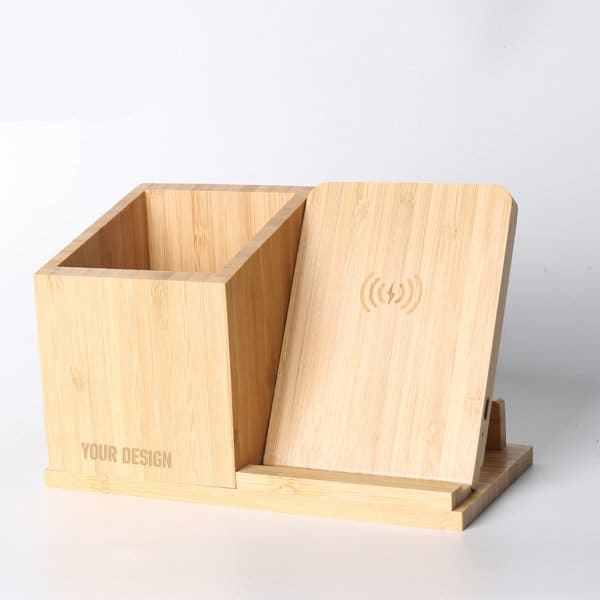 A bamboo pen holder with a wireless charger. The holder features a sleek design with a light wooden finish. A bamboo pen holder with a wireless charger. The holder features a sleek design with a light wooden finish.