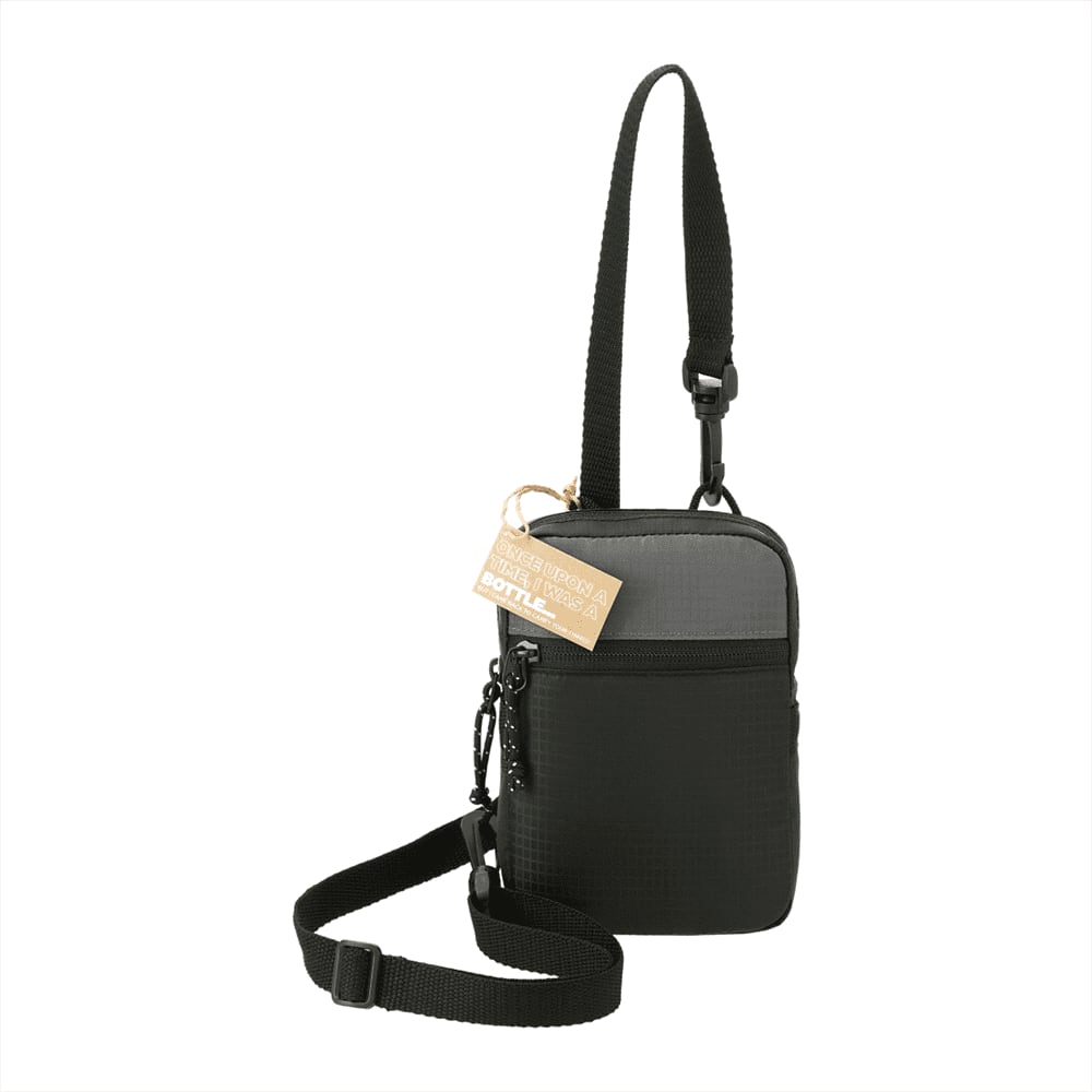 A black and grey crossbody pouch with an adjustable strap and a tag. It features a logo on the front. NBN Trailhead Recycled Crossbody Pouch - Image 1
