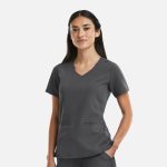 A women's curved V-neck top in grey, featuring short sleeves and side pockets. The top has a branding logo.