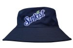 A navy blue reversible bucket hat featuring an embroidered logo. The fabric appears breathable and suitable for warm weather.