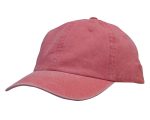 A pink enzyme washed pigment dyed cotton twill cap featuring a curved brim and a logo.