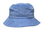 A light blue terry towelling bucket hat with a wide brim and a soft texture. It features a logo.