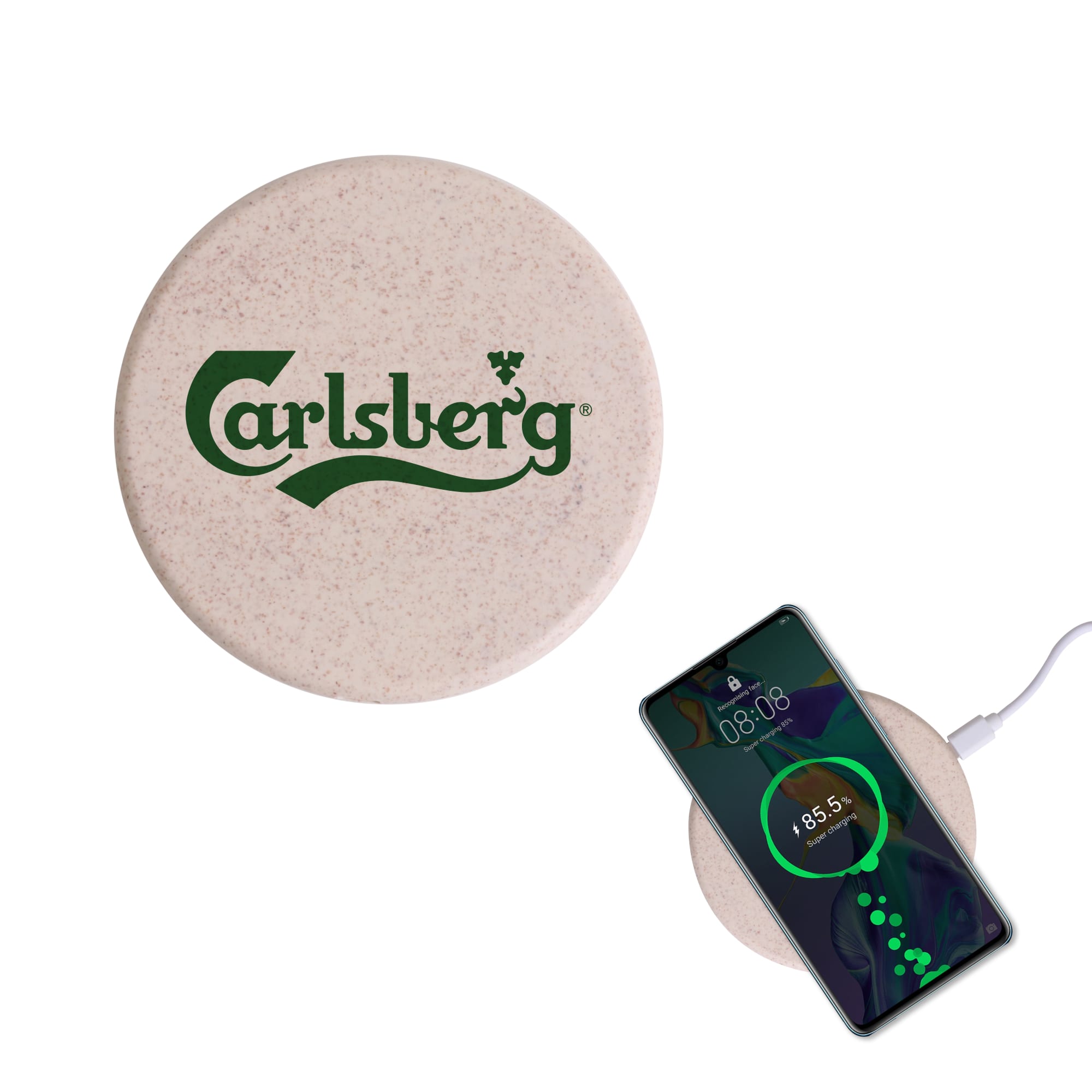 A round wheat straw wireless charger in a light beige colour with a logo, next to a smartphone displaying charging progress. Wheat Straw Wireless Charger - Image 1