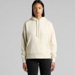 A cream-coloured hoodie with a front pocket and drawstring hood, featuring a logo.