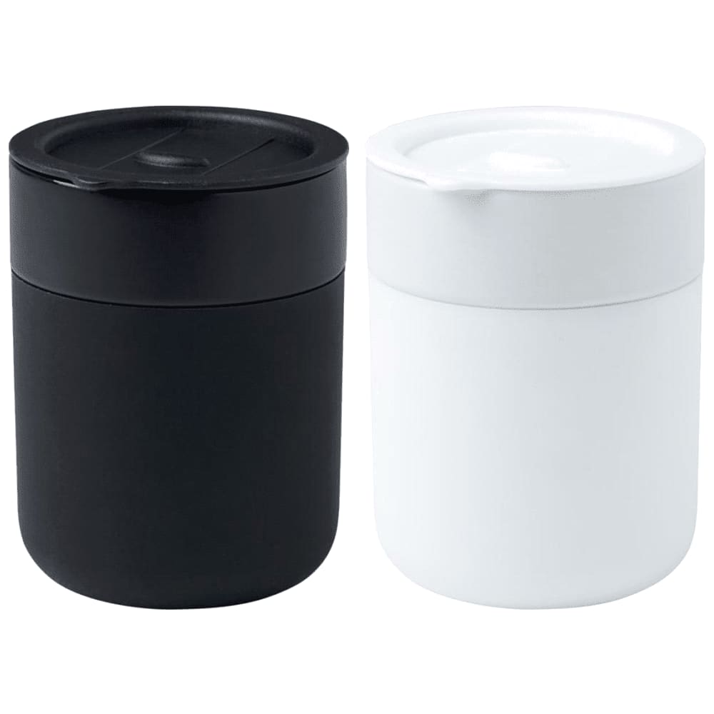 A ceramic tumbler set featuring one black and one white tumbler with silicone wraps and lids. Each tumbler has a smooth finish. Java 330 ml Ceramic Tumbler w/ Silicone Wrap - Image 1