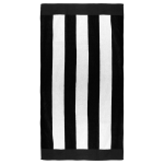 A striped beach towel featuring alternating black and white hues, with a border. It includes branding.