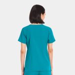 A women's v-neck top in teal, featuring short sleeves and a smooth fabric texture. The top has a logo.