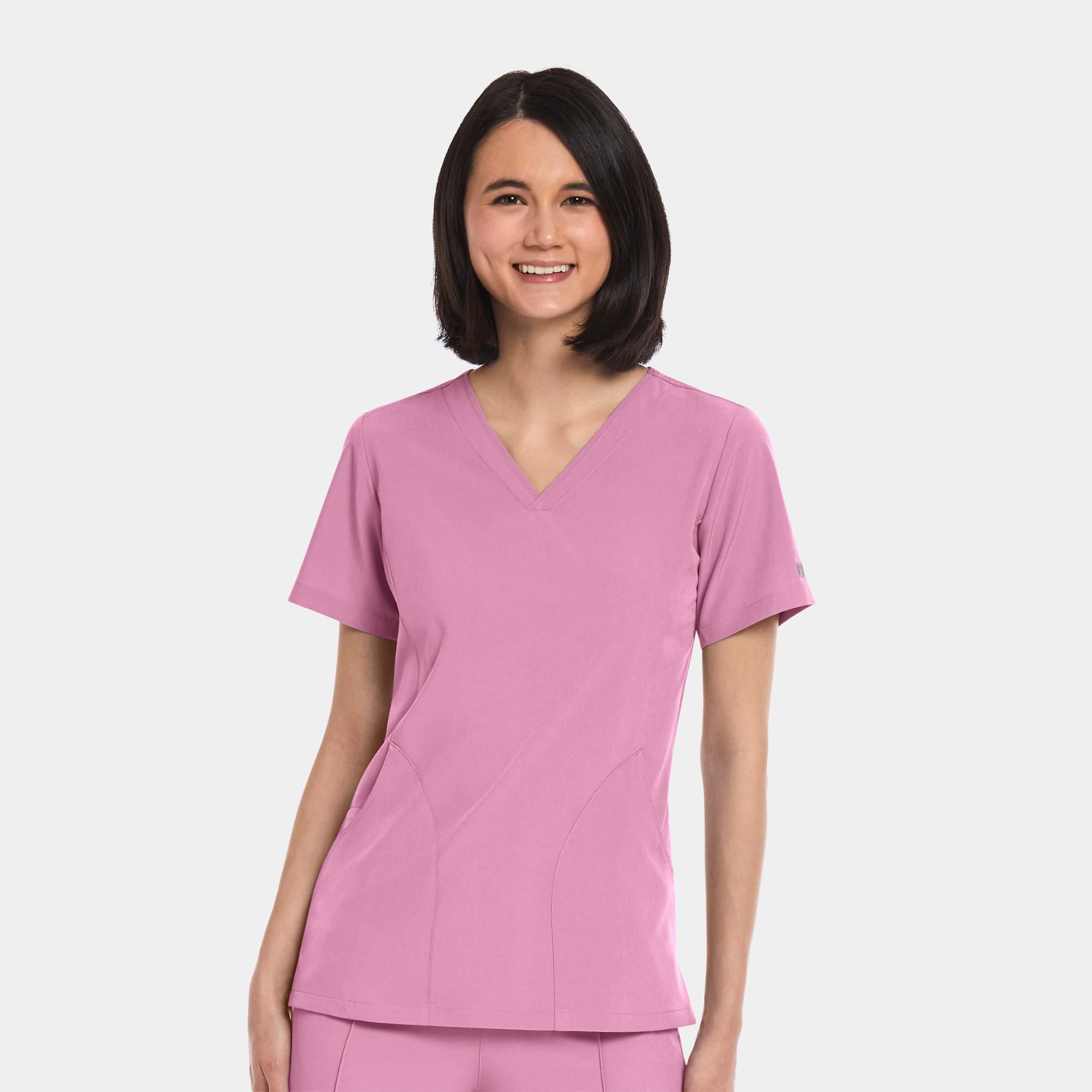 A women's V-neck top in pink with a fitted design and short sleeves, featuring a logo. A women's V-neck top in pink with a fitted design and short sleeves, featuring a logo.