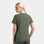 A women's mock wrap top featuring contrast panels in green tones, showcasing a relaxed fit and short sleeves.