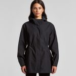 A soft shell jacket in black with a zippered front, adjustable waist, and a hood, featuring a logo.