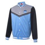 A light blue sports jumper with black sleeves and a logo. Features horizontal stripes and a button-up front.
