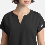 A women's black dolman top featuring a V-neck design and a chest pocket, with a logo on the side.