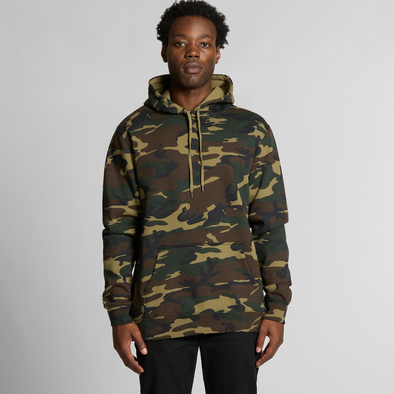A camouflage hoodie in shades of green and brown, featuring a front pocket and a drawstring hood. A camouflage hoodie in shades of green and brown, featuring a front pocket and a drawstring hood.