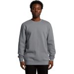 A grey hoodie is displayed on a male model, featuring a classic crew neck and long sleeves, with a logo present.