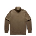 A khaki sweater featuring a half zip design, with long sleeves and a ribbed neckline. It has a logo.