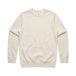 A cream-coloured jumper with a classic crew neck and long sleeves. It features a subtle logo on the label.