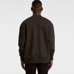 A dark green jumper with a relaxed fit, featuring a round neckline and long sleeves. It has a logo on the back.