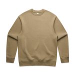 A beige sweater with a rounded neckline and long sleeves. The sweater has a logo on it.