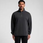 A black half-zip jacket with a relaxed fit and a small zippered collar. It features a logo on the chest.
