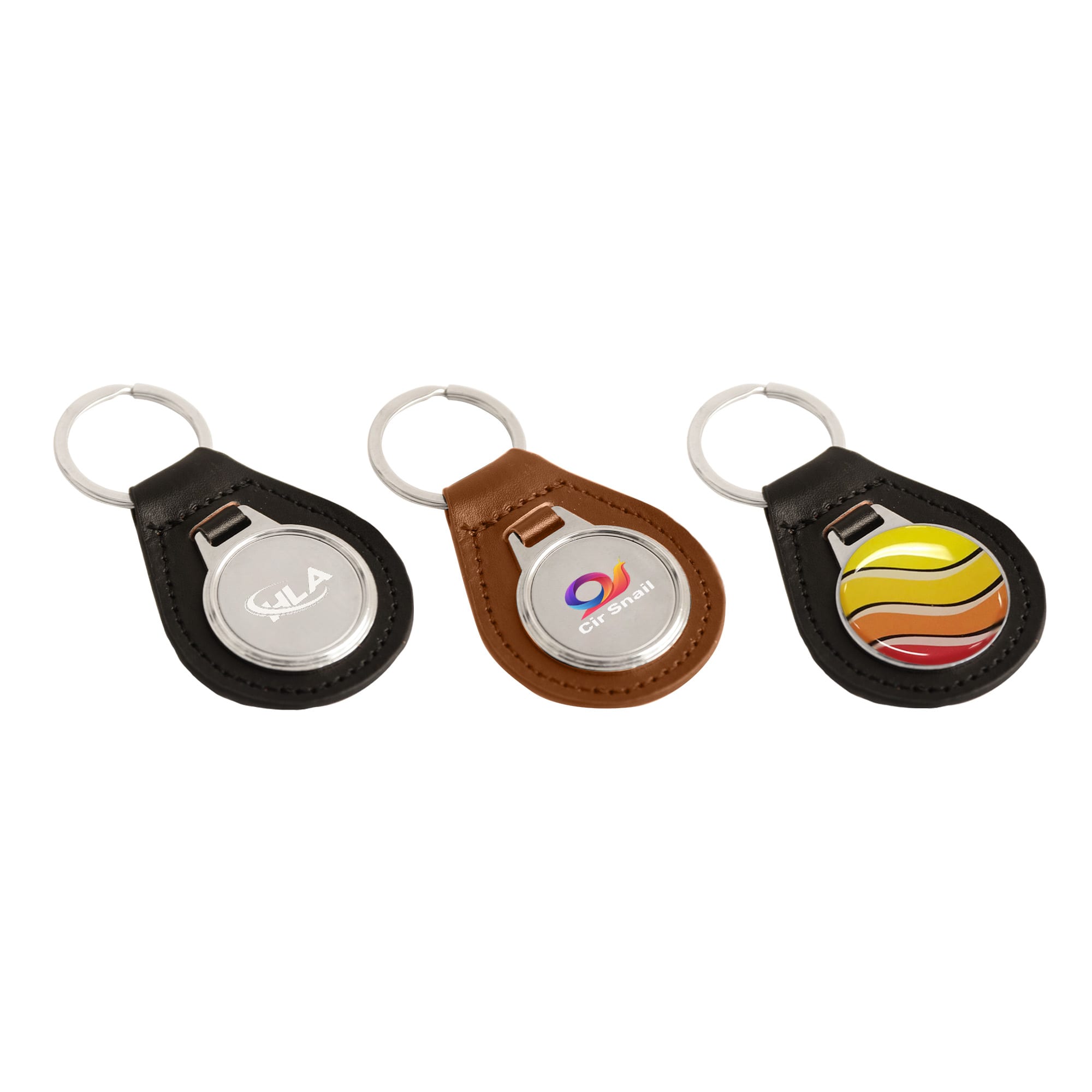 Three PU leather keyrings in black, brown, and featuring a multicoloured design, each with a metal ring. PU Leather Metal Keyring D - Image 1