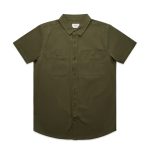 An olive green short-sleeve shirt featuring two chest pockets and a collar, with a logo on the tag.