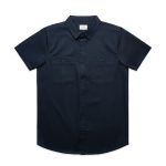 A navy blue short-sleeved shirt with two chest pockets and a collared neckline, featuring a small logo.