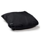 A black Cyrus Windbreaker folded and zipped for easy storage, featuring a logo on one side.